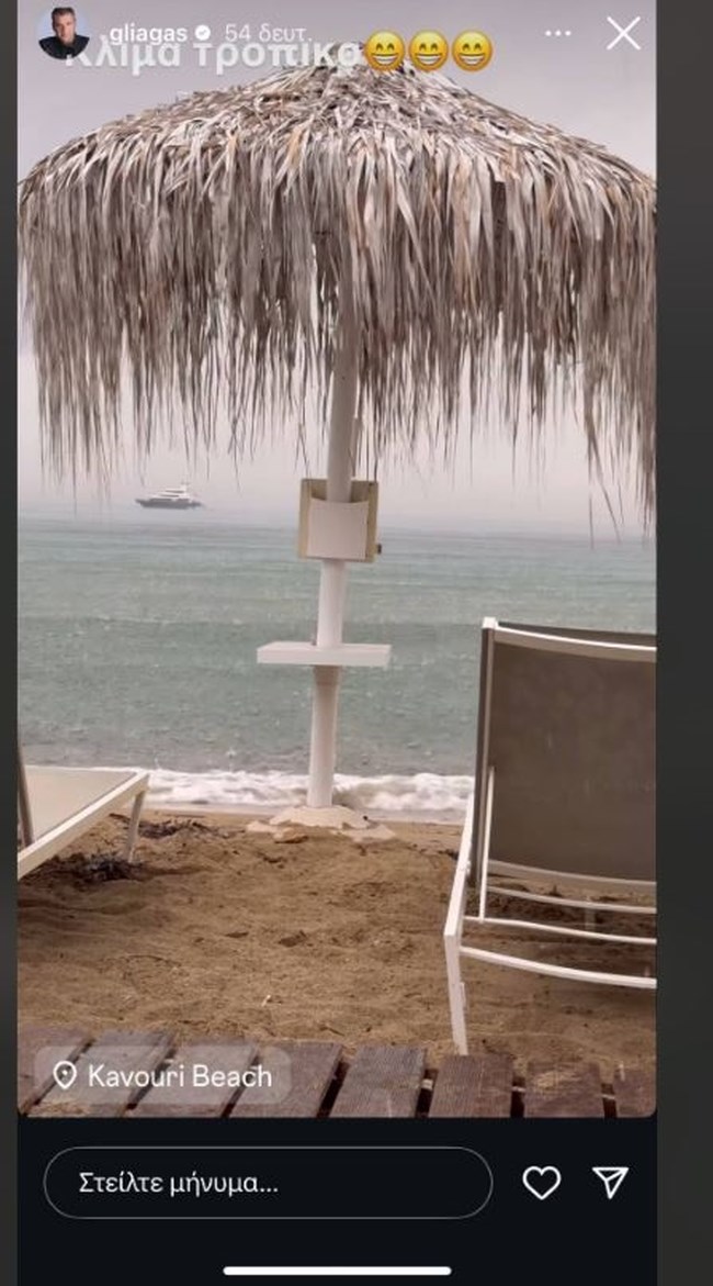 Βουτιές υπό βροχή για τον Γιώργο Λιάγκα - Δίπλα στο κύμα η Μαρία Αντωνά