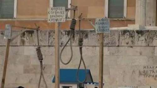 Οι &quot;αγανακτισμένοι&quot; χτύπησαν και τις ΗΠΑ;- Οι κρεμάλες, το σχόλιο Λοβέρδου και οι αντιδράσεις