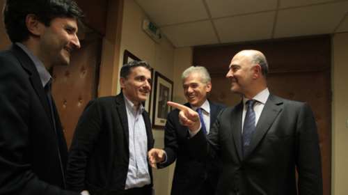 Τι είπε ο Μοσκοβισί για τη γραβάτα του Χουλιαράκη