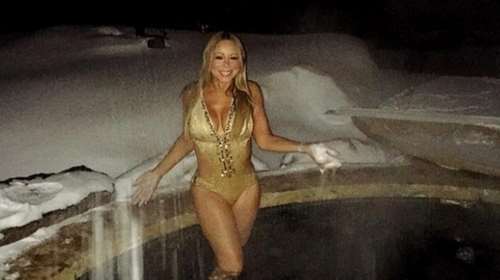 Η καυτή Μαράια Κάρει φόρεσε χρυσό μαγιό και κολύμπησε στο χιόνι...