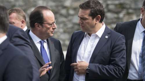 Συνάντηση Τσίπρα - Ολάντ στο Αμπού Ντάμπι πριν το Eurogroup