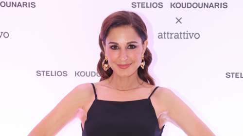 H Κατερίνα Παπουτσάκη χαμογελαστή στην αγκαλιά του συντρόφου της