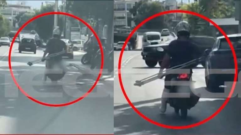 Αδιανόητο: Με γύψο στο πόδι και πατερίτσες στο χέρι οδηγάει μηχανάκι σε κεντρική λεωφόρο [βίντεο]