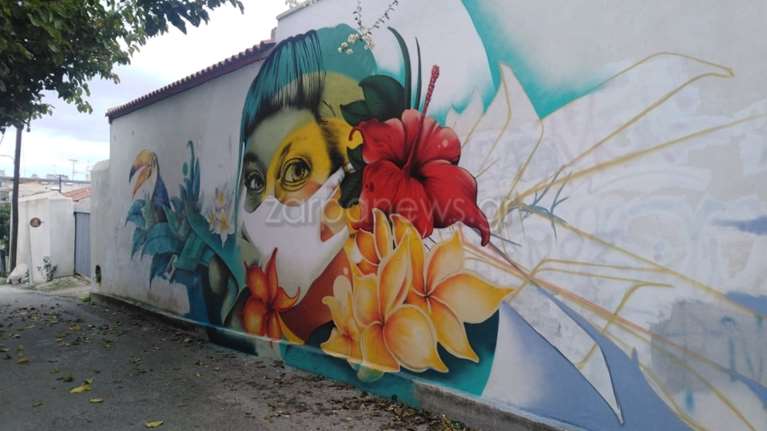 Κορονοϊός: Το εντυπωσιακό γκράφιτι κοπέλας με μάσκα στα Χανιά [εικόνες[