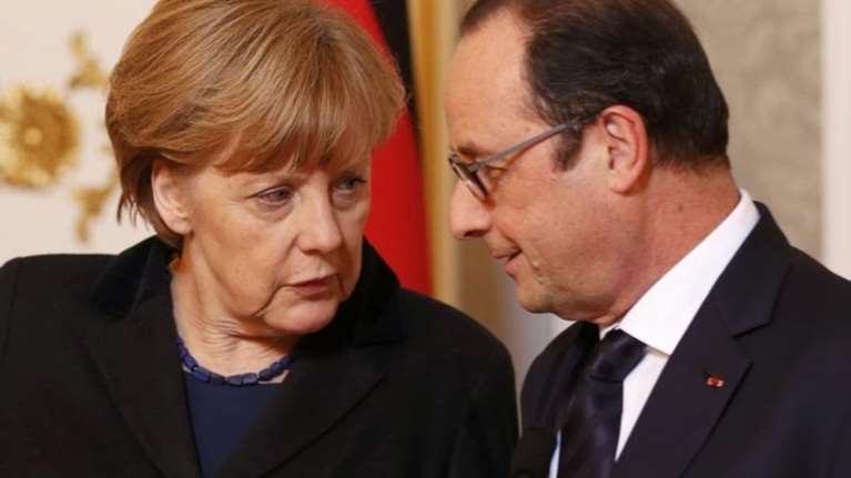 Monde: Τριγμοί στο δίδυμο Μέρκελ-Ολάντ λόγω προσφυγικού