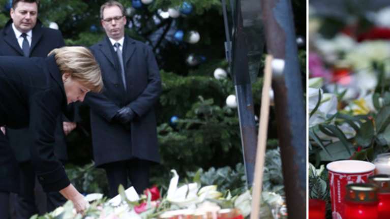 «Προσκύνημα» Μέρκελ στον τόπο της τραγωδίας στο Βερολίνο  - φωτό -