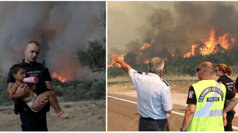 Πύρινη κόλαση στα Δερβενοχώρια: Αστυνομικοί παίρνουν αγκαλιά μικρά παιδιά για να τα σώσουν [εικόνες, βίντεο]