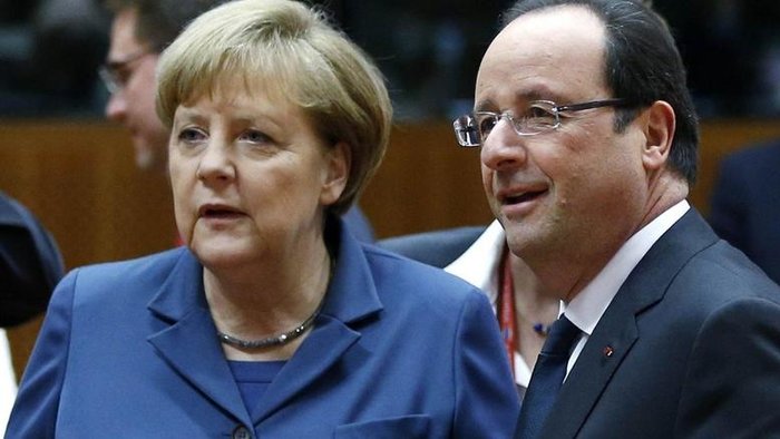 Άνγκελα Μέρκελ και Φρανσουά Ολάντ κατά τη διάρκεια παλαιότερης Συνόδου Κορυφής