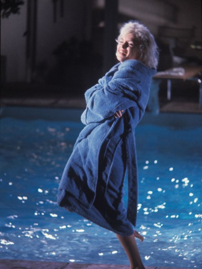 Lawrence Schiller – Marilyn Monroe (In Robe, Smiling, with Leg Up), 1962$3,500.00